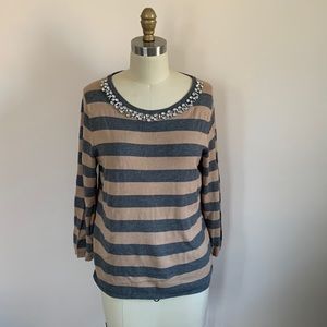 Tan and charcoal striped sweater with jeweled neckline